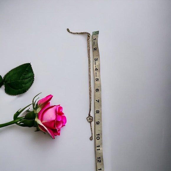 Feminine and Classy Necklace with Flower Pendant and Gem Charm in Black - Picture 2 of 3